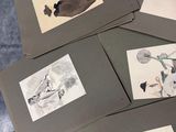 four cards with drawings of animals on them sitting on a table