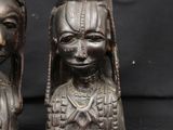 pair of antique african carved wood head sculptures of a woman and a man