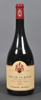 a bottle of wine sitting next to a bottle of wine