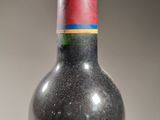 a bottle of wine that is sitting on a table