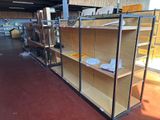 many shelves in a store with many items on them