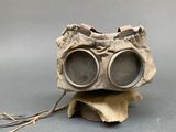 a pair of goggles sitting on top of a piece of paper