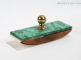 rectangular shaped green marble box with a brass ball on top