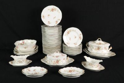 a lot of plates and cups on a black table