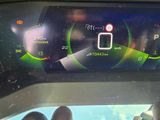 a close up of a car dashboard with a digital display