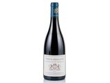 a bottle of red wine on a white background