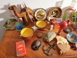 a wooden table topped with various items on top of it