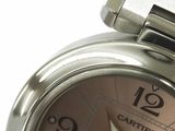 a close up of a wrist watch with a pink dial
