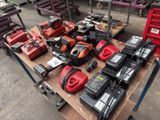 many different tools on a table in a garage