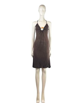 an image of a mannequin wearing a brown dress on a mannequin mannequin