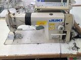 a machine that is sitting on a table in a factory