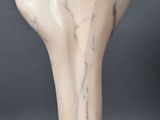 marble sculpture of a woman ' s head on a marble base