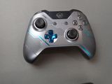 a close up of a video game controller on a table