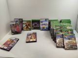 a lot of video games on a white table