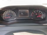a picture of a dashboard of a car with gauges and numbers