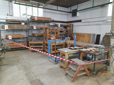 a large room with a lot of wooden furniture in it