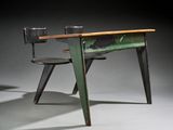 a table with two chairs and a chair on it