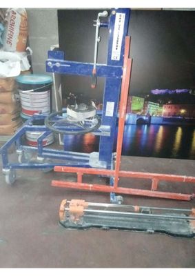 a picture of a fork lifter sitting in a garage