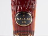 a bottle of ruma ox on a white surface