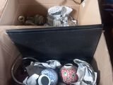 a box full of stuff that is sitting on the floor