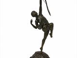 an image of a bronze statue of a man with a bow