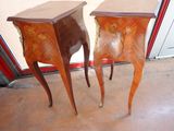 two tables that are sitting next to each other on the floor