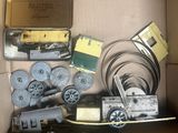 a box with a bunch of toy trains in it