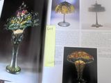 an open book with a picture of a lamp on it