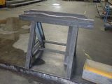 a picture of a workbench in a factory with a lot of tools