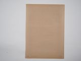 an image of a piece of brown paper sitting on top of a table