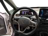 the interior of a car with a steering wheel, dashboard, and other electronics