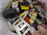 a bag full of cosmetics and other items in it