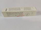 a box of toothpaste sitting on a white surface