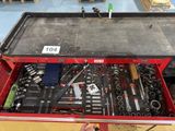a red tool box with a lot of tools inside of it