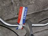 a sticker on the handlebars of a bicycle