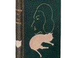 an old book with a picture of a woman and a cat on it