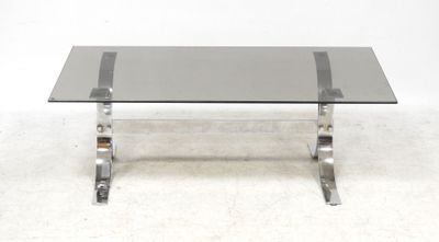 an image of a glass and chrome coffee table
