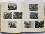 an open book with a bunch of pictures of people in military uniforms
