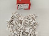 a box of white electrical parts sitting on a table