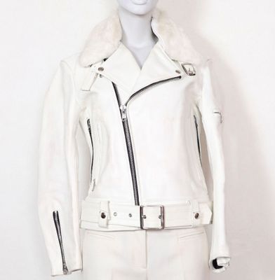 the mannequin is wearing a white leather jacket with a fur collar