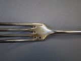 a fork that is sitting on a table