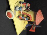 a toy airplane with a man and a woman on it