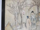 a picture of a man and a woman standing in front of a tree