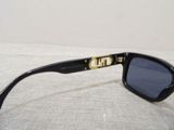 versa versa versa versa sunglasses with gold hardware and black lenses