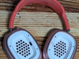 a pair of headphones sitting on a wooden table