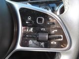 a close up of a steering control in a car