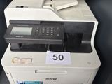 a printer that is sitting on top of a desk