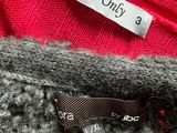 a label on a sweater that says women only 3