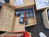 a box full of electronic equipment and a pair of shoes
