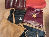 a lot of purses on the floor on the floor